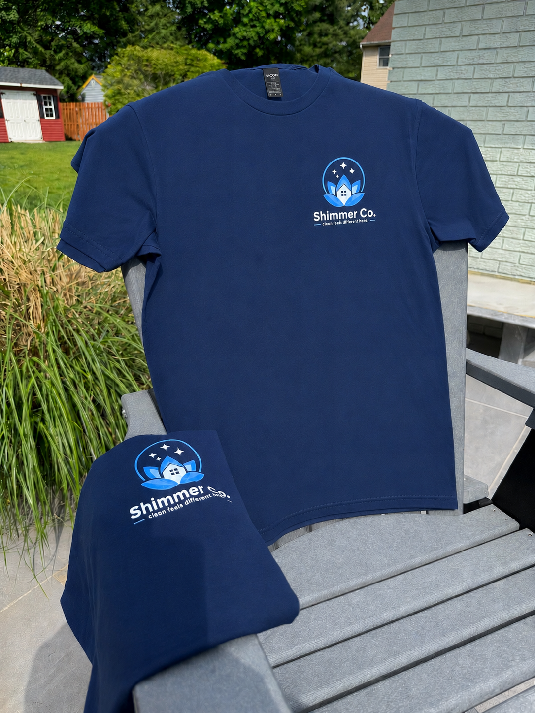 A Shimmer Co. cleaner in branded shirt